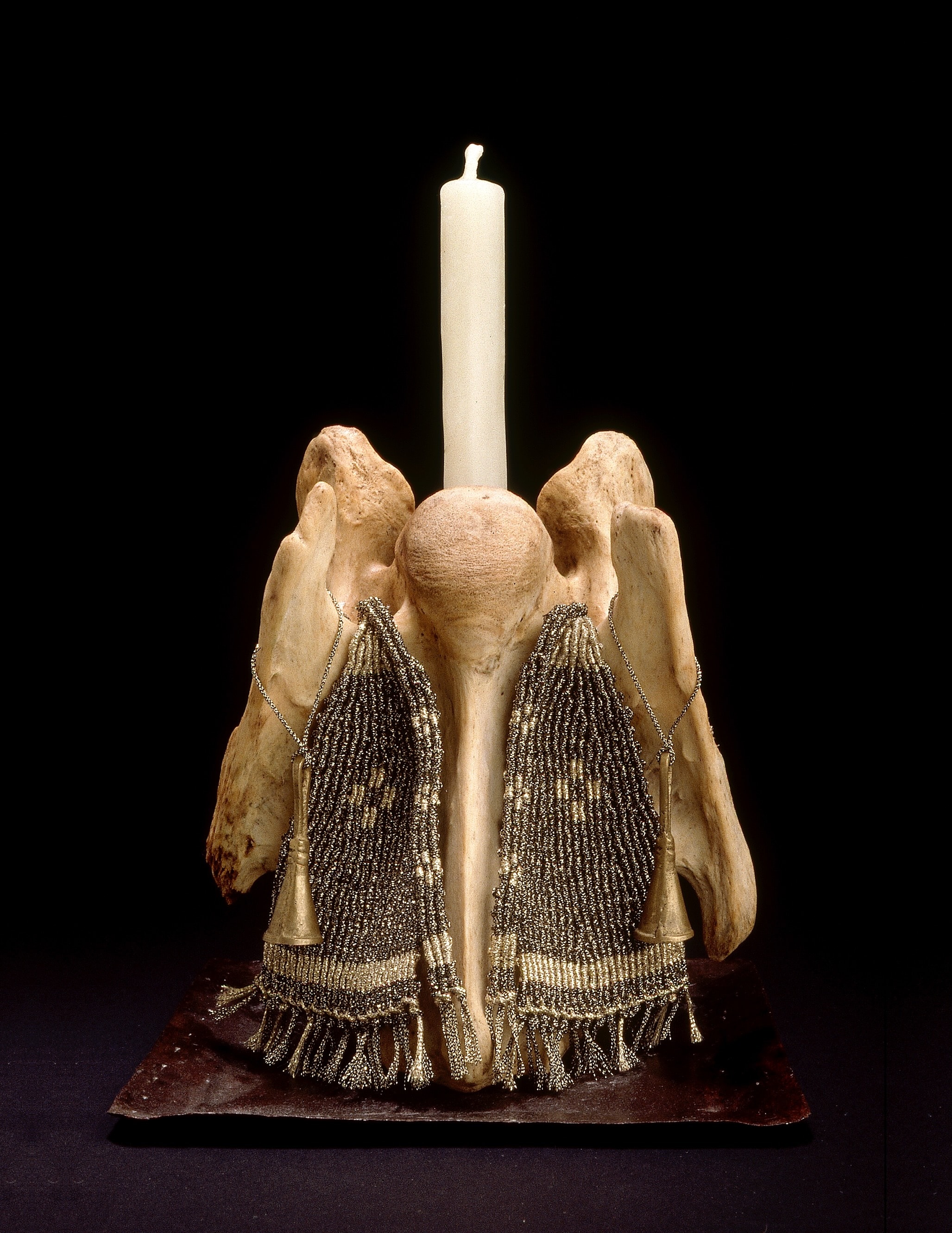 The Choirmaster — single bone sculpture with beaded vestment and candle
